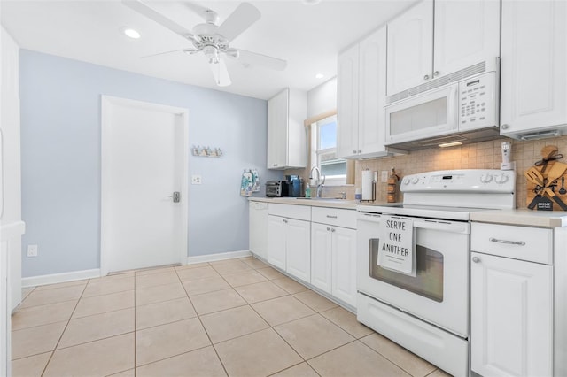 kitchen featuring sink, white cabinetry, light tile patterned floors, ceiling fan, and white appliances