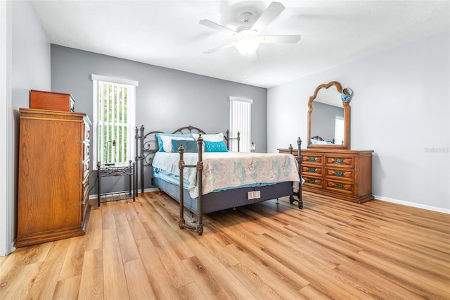 bedroom featuring ceiling fan and light wood-type flooring