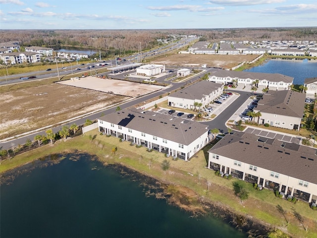 drone / aerial view with a water view