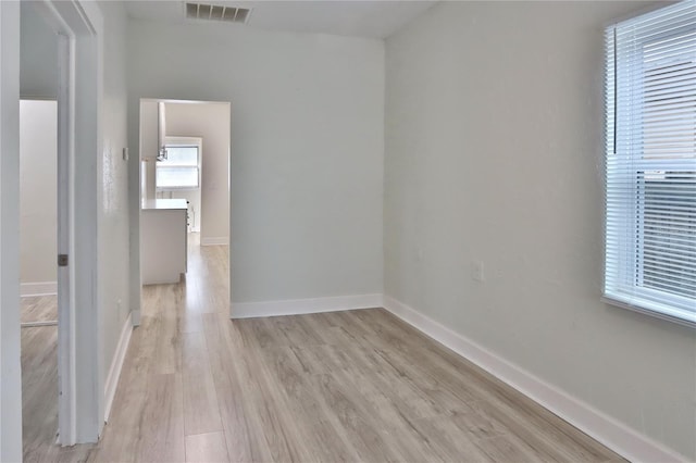 empty room with light wood-type flooring