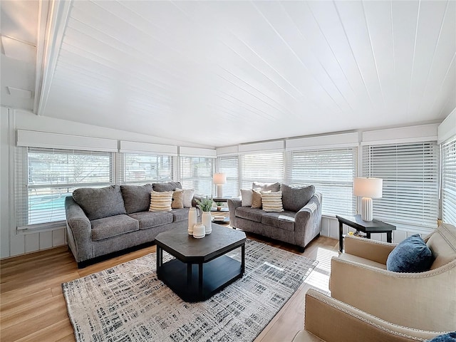 sunroom / solarium featuring wood ceiling