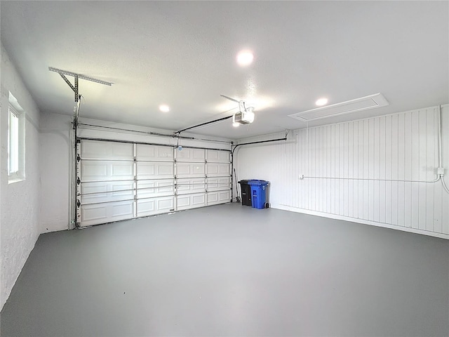 garage featuring a garage door opener