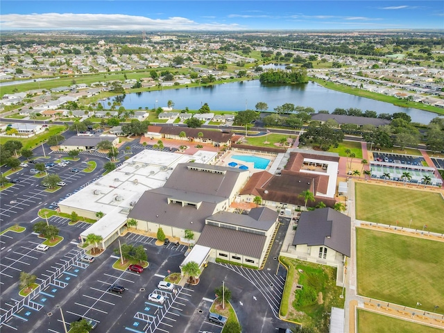 drone / aerial view with a water view