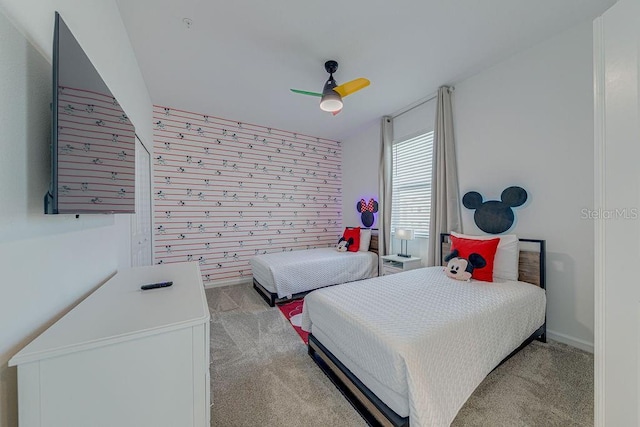 bedroom featuring ceiling fan and light colored carpet