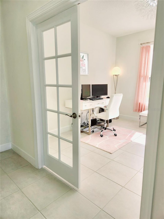 office featuring light tile patterned floors and french doors