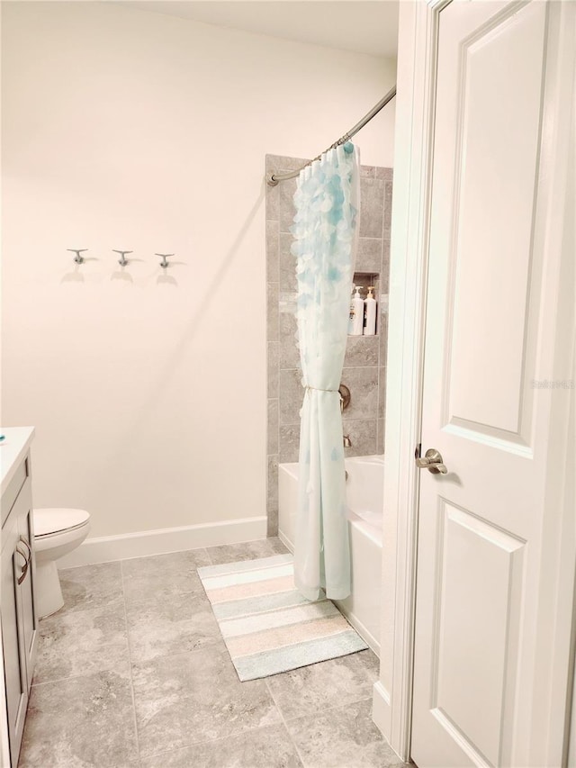 full bathroom featuring vanity, toilet, and shower / bath combo