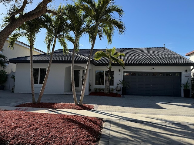 view of front of home with a garage