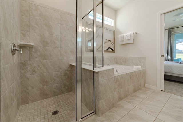 1166 Aloha Blvd, Davenport, FL 33897 - ensuite bathroom featuring a shower stall and a bath