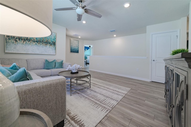 1166 Aloha Blvd, Davenport, FL 33897 - living area with light wood-style floors, a ceiling fan, and recessed lighting