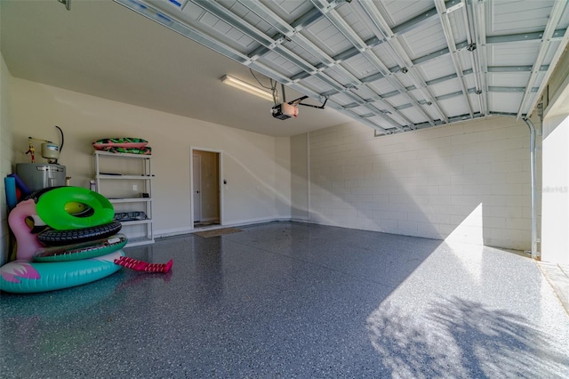 garage featuring electric water heater