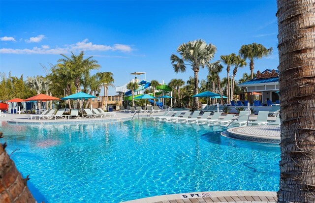 1166 Aloha Blvd, Davenport, FL 33897 - community pool with a patio