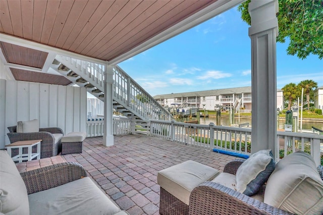 view of patio / terrace with a water view