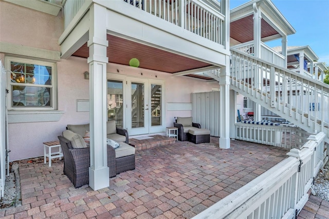 view of patio with french doors and an outdoor hangout area