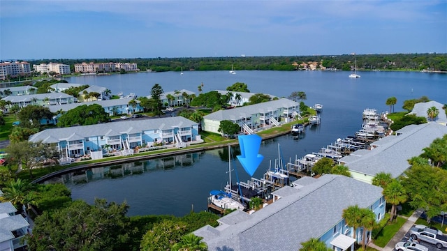 birds eye view of property featuring a water view