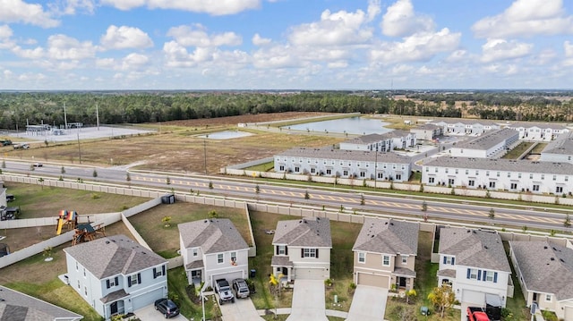 drone / aerial view with a water view