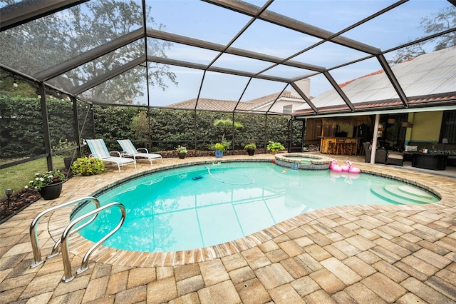 view of pool featuring a patio area, glass enclosure, an outdoor bar, an in ground hot tub, and an outdoor living space