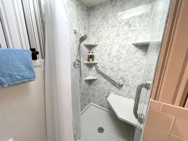 bathroom featuring walk in shower