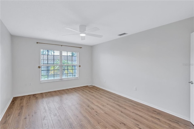 unfurnished room featuring ceiling fan and light hardwood / wood-style floors