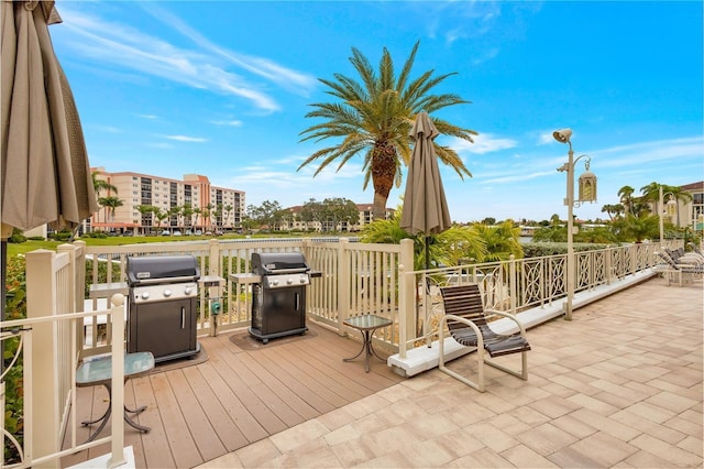 wooden deck featuring area for grilling