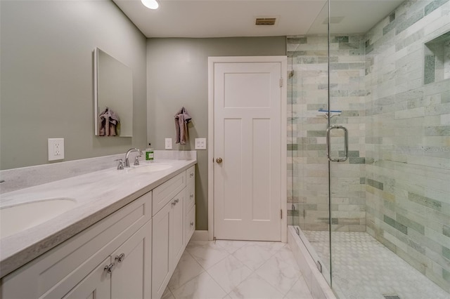 bathroom featuring vanity and walk in shower