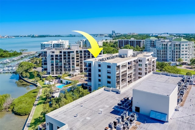 birds eye view of property featuring a water view