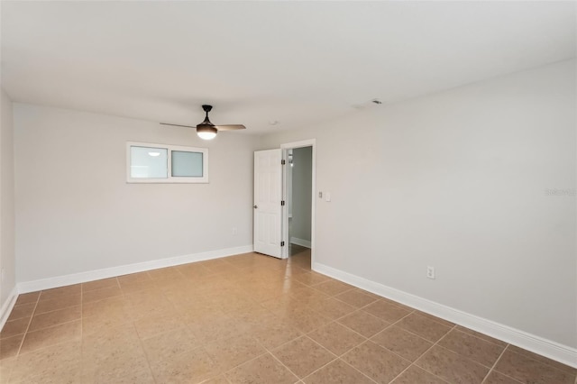 spare room featuring ceiling fan