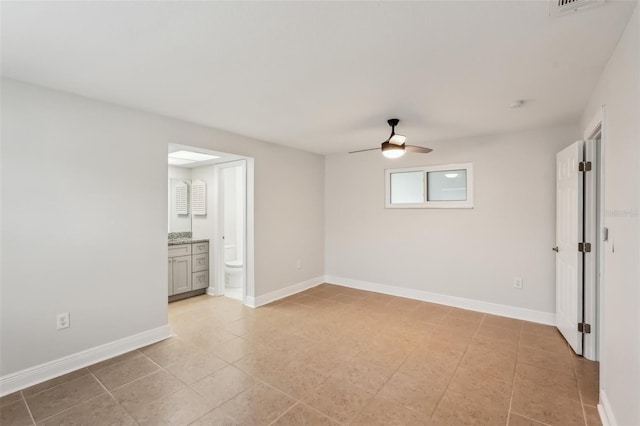 unfurnished room with ceiling fan