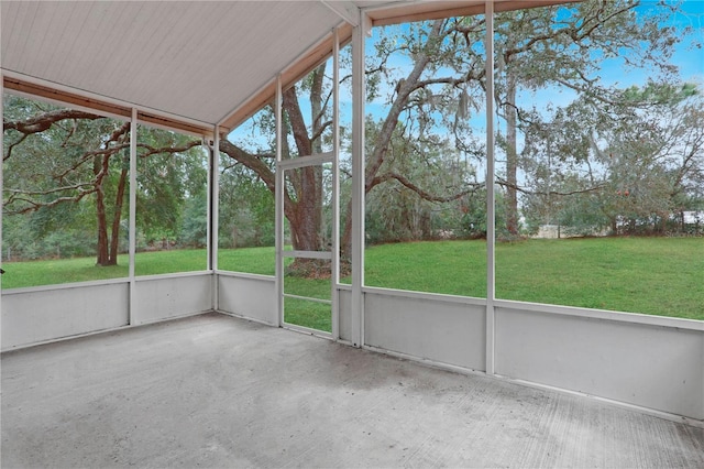 unfurnished sunroom with lofted ceiling