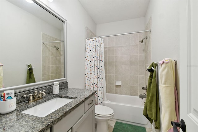 full bathroom with vanity, shower / bath combination with curtain, and toilet