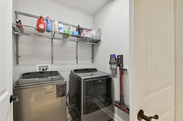 laundry area featuring independent washer and dryer