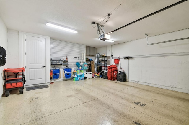 garage featuring a garage door opener