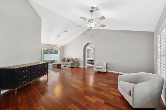 sitting room featuring dark hardwood / wood-style flooring, ceiling fan, and lofted ceiling