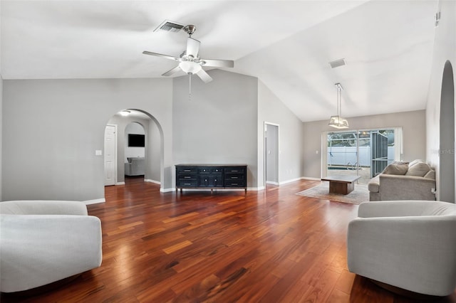 living room featuring ceiling fan, dark wood-type flooring, and vaulted ceiling