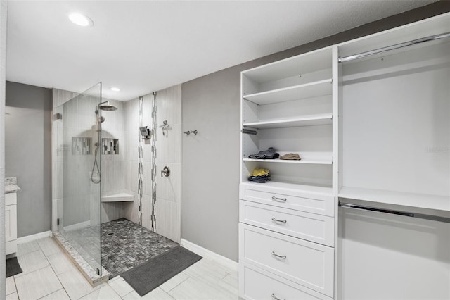 bathroom featuring tiled shower