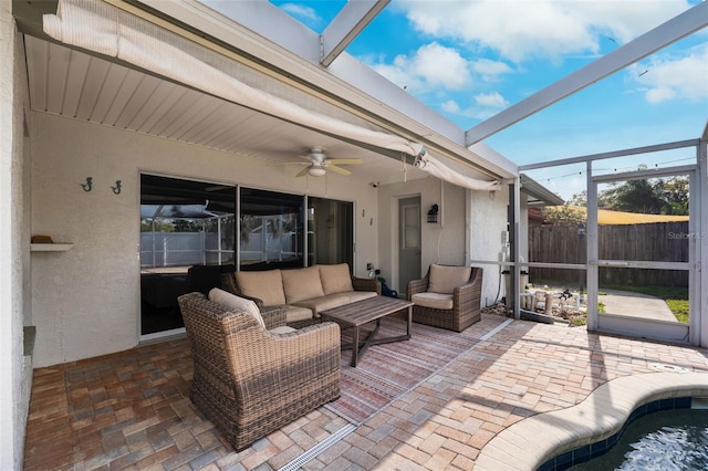 sunroom / solarium with ceiling fan