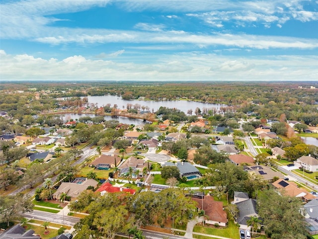 drone / aerial view with a water view