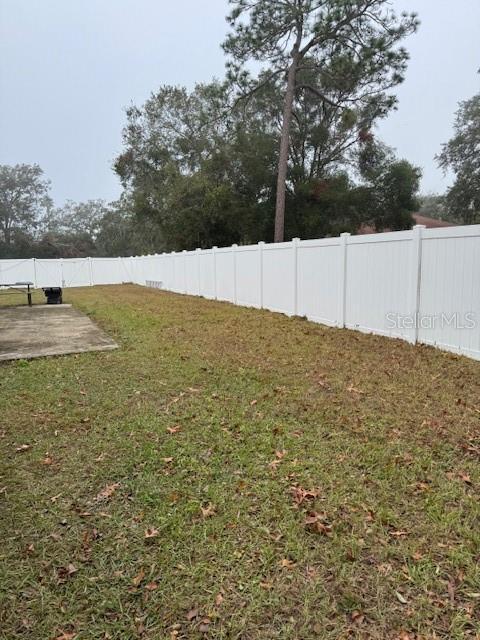 view of yard with a patio area