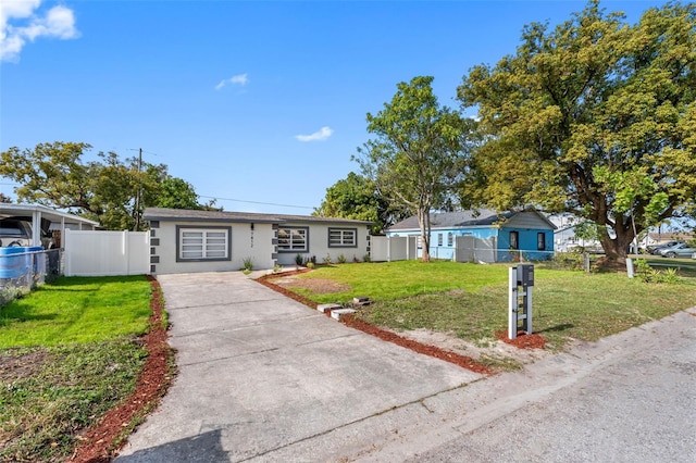 view of front of home with a front lawn