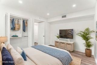 bedroom featuring light hardwood / wood-style floors