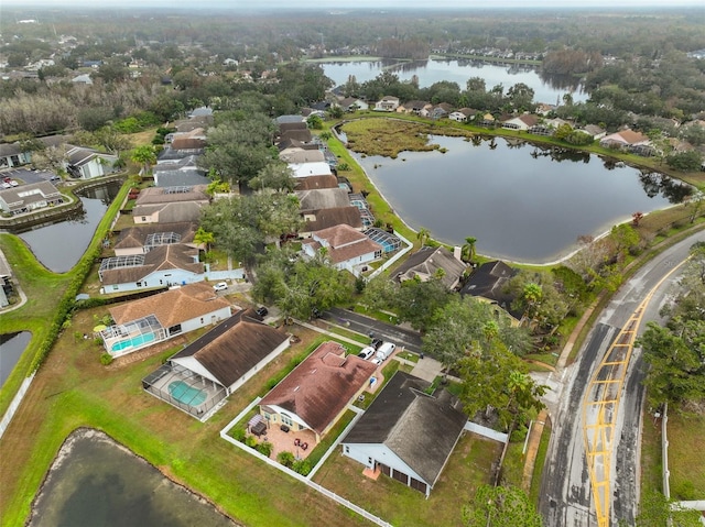 drone / aerial view with a water view