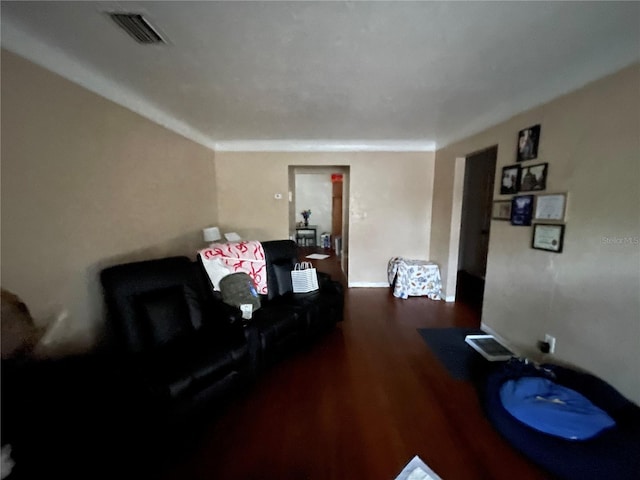 living room with dark hardwood / wood-style floors