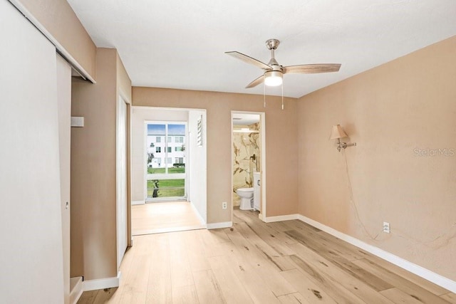 interior space featuring ceiling fan and light hardwood / wood-style flooring