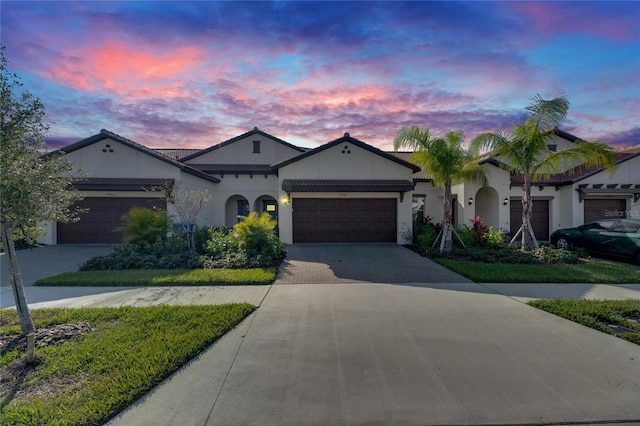 view of front of property with a garage