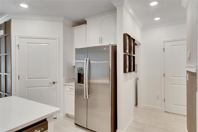 kitchen featuring white cabinets, dishwasher, crown molding, and stainless steel refrigerator with ice dispenser