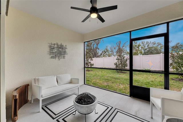 sunroom / solarium with ceiling fan