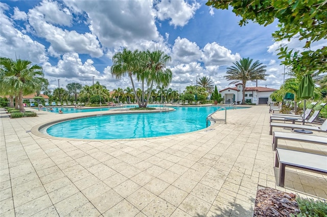 view of pool featuring a patio