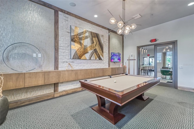 rec room with carpet flooring, a chandelier, and pool table