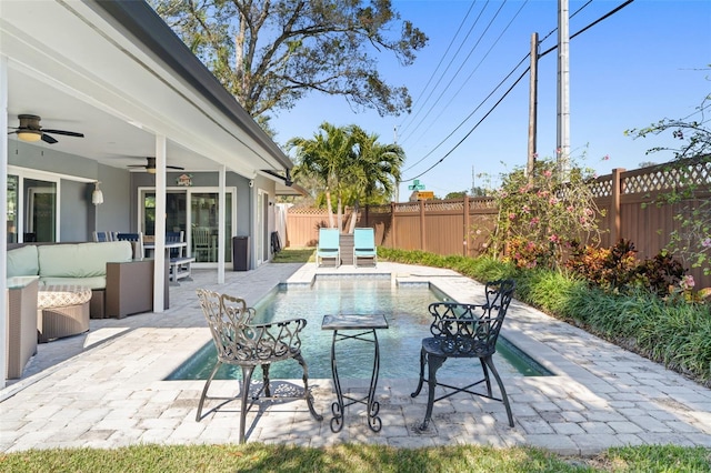 view of pool featuring ceiling fan, a patio area, and an outdoor hangout area