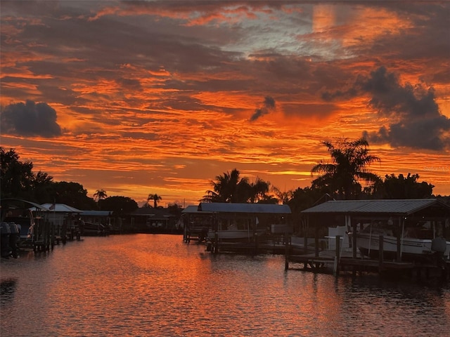 property view of water with a dock