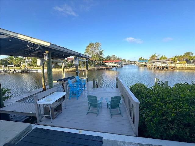 dock area featuring a water view and central AC